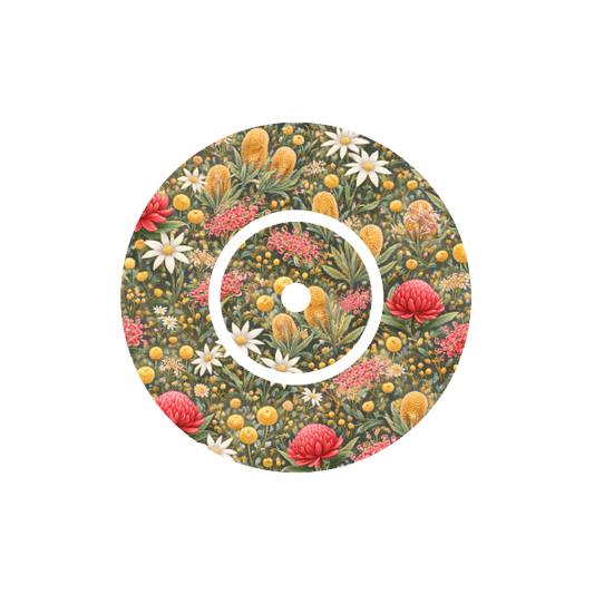 Circular design with Australian native floral pattern on a green background fits CGM FreeStyle Libre 2 device.