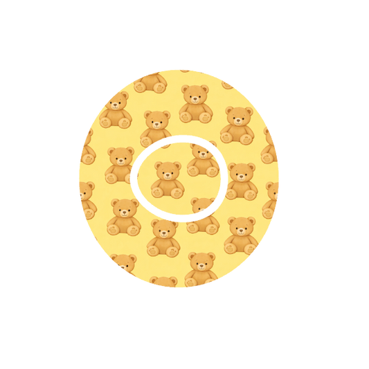 Circular design with teddy bear pattern on a yellow background fits CGM Dexcom One+ and G7 device.