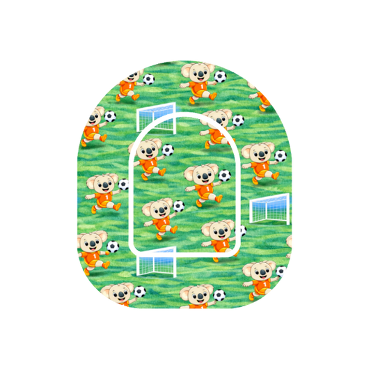 Koala's playing soccer on green grass background patch for Omnipod 