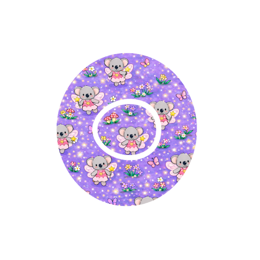 Binki Fairy Garden CGM patch for Dexcom One+ — Binki koala as fairy in garden with mushrooms and flowers
