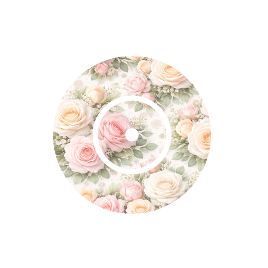 Round design with soft pink, apricot and white roses on a off white background fits CGM FreeStyle Libre 2 device.
