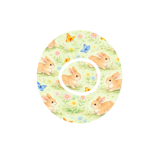 Bunny Meadow CGM patch for Dexcom G7 — animated bunnies with butterflies in flower meadow