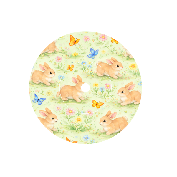 Circular shape soft animated Bunnies playing with butterflies in a meadow of flowers with a cream background fits CGM FreeStyle Libre 2 device.
