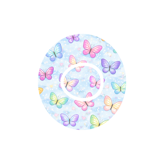 Circular shape with colourful  group of pastel butterflies on a light blue background fits CGM Dexcom One+ and G7 device.