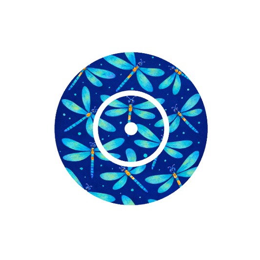 Circular design with multiply dragonflies in pattern on a dark blue background fits CGM FreeStyle Libre 2 device.