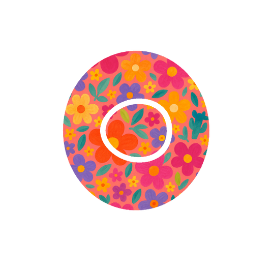 Circular shape retro flower pattern bright colours on a soft pink toned background fits CGM Dexcom One+ and G7 device.