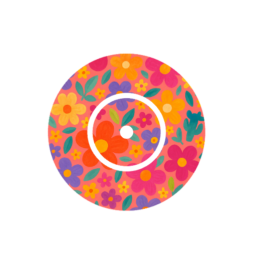 Circular shape retro flower pattern bright colours on a soft pink toned background fits CGM FreeStyle Libre 2 device