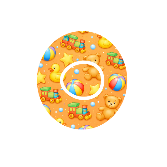 Circular design of colourful  cartoon teddy bear, spin top, blocks, train , duck, stars and various shaped toys. On a light blue background fits CGM Dexcom One+ and G7 device.