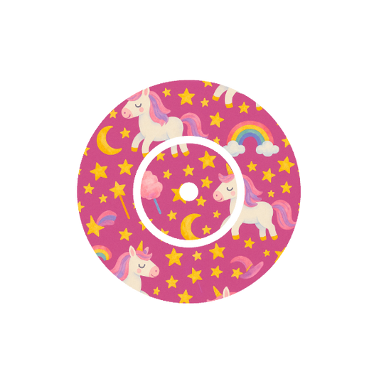 Circular design with unicorns, moons , shooting starts , fairy floss, rainbows and star pattern on a pink background fits CGM FreeStyle Libre 2 device.
